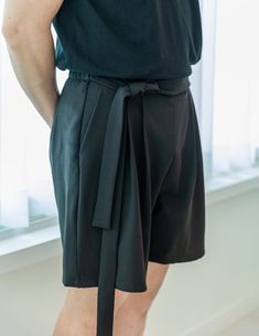 This is a Korean Modern Hanbok Summer Short Pants for Men & Women. This hanbok is modernly designed so you can wear it comfortably and beautifully. These pants have an elastic band at the back of the waist to make the waist size comfortable, and waist straps are attached to both ends of the waist to keep the feel of traditional hanbok. It is very comfortable to wear with a long rise and a wide trouser body, and it is practical with large pocket. This modern hanbok is perfect for daily and celebrations such as parties or various events. 📐Male model size Height 6.0ft(183cm) Weight 165lb(75kg) Waist circumference 32in(81.28cm) Wearing a size M pants 🟠 Decorate more stylishly with accessories that go well with Hanbok. 🟠 Go look hanbok accessories: https://www.etsy.com/shop/LunarJogak?ref=se Modern Black Belted Bottoms, Black Workwear Pants With Short Leg, Black Short Leg Pants For Work, Black Short-leg Pants For Workwear, Black Workwear Cropped Pants, Workwear Pants With Hip Pockets, Black Wide Leg Shorts With Belt Loops, Hanbok Pants, Hanbok Accessories