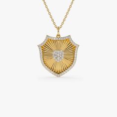 Diamond Charm  / 14k Gold Diamond Shield Medallion Pendant / Sunburst Armor Badge Pendant Necklace  ▶ Details   * Made to Order * Gold KT: 14K Solid Gold (also available in 18K & Platinum upon request) * Length: 18.75 MM * Width: 19.00 MM * Round Diamonds: 63 Pcs 1.00MM * Round Diamonds: 4 Pcs 1.20MM * Total Ctw: 0.35 Ctw * Color and Clarity: G Color SI Clarity * Ready to Ship in 1-2 Business Days ▶ See more of our Diamond Necklace - http://etsy.me/2mqa6O1  ▶ See our storefront here - http://etsy.me/2lUcVnH  ▶ All store sections here * Diamond Rings - http://etsy.me/2lwKUl8  * Diamond Earrings - http://etsy.me/2lyqVBP  * Diamond Necklace - http://etsy.me/2mqa6O1  * Diamond Bracelets - http://etsy.me/2mVrAB5  * Diamond Wedding Rings - https://etsy.me/3YbpVq2  * Gold Wedding Band - https://e Luxury Yellow Gold Medallion Diamond Necklace, Luxury 14k Gold Medallion Diamond Necklace, Rose Gold Charms, Gold Armband, Medallion Necklace, Ruby Jewelry, Diamond Charm, Emerald Jewelry, Sapphire Jewelry