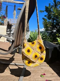 The Crochet Sunflower Crossbody Bag is so cute and holds so much! You also have the choice of having a cover that buttons closed so you don't have to worry about things getting lost or falling out! Everyday Sunflower Tote Bag, Everyday Sunflower Design Tote Bag, Yellow Sunflower Design Bags For Daily Use, Cute Rectangular Crochet Travel Bag, Everyday Rectangular Bag With Sunflower Design, Rectangular Bag With Sunflower Design For Everyday Use, Cute Handmade Crossbody Bags, Handmade Adjustable Crossbody Bag, Cute Handmade Yellow Bags