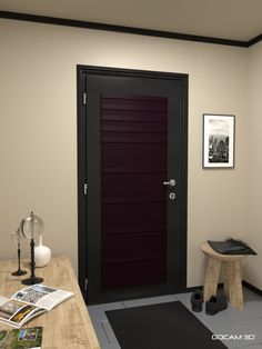 a room with a table, stool and door in the corner that has a magazine on it