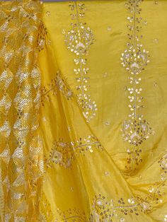 This elegant traditional Yellow Gold Bridal Phulkari Dupatta is expertly crafted from Pure Chinon Silk, with Gotta Patti and phulkari hand embroidery all over. The perfect choice for weddings, sangeet, jaago, and chunni ceremonies. Material: Pure silk chinon Work: Silk thread phulkari handwork, needlework, gotta patti work Pattern: Floral Size: Full Size 2.5 meters Dispatched in 1-3 business days Product Note:​ This is a handcrafted product from artisans and producer groups and due to the nature Phulkari Pants, Gotta Patti Work, Bridal Dupatta, Phulkari Dupatta, Velvet Shawl, Gotta Patti, Work Pattern, Party Wear Lehenga, Beautiful Suit