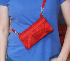 "There are three ways to wear this bag.  1. Clip-on to your belt loop for an easy hands free option 2. Crossbody 3. Over the shoulder  It can also be clipped onto your luggage or backpack.  It can easily carry a 6\" long phone, credit cards, sunglasses, and other everyday essentials in the main and front pockets. Every pouch is uniquely pieced together from remnant pieces of fabric from previous projects. The bag is 8\" long and 4\" deep with a zipper opening of 7\". The zipper front pocket is 8\" long and 3\" deep. The adjustable strap when fully extended is roughly 50\". Please visit my shop RemnantGuru for more clip-on pouch colors and designs. Products normally ship Wednesday morning, Thursday afternoon, and on Saturday." Morning Thursday, Thursday Afternoon, Wednesday Morning, Tuesday Morning, Hip Bag, Everyday Essentials, Zipper Pouch, Hands Free, Credit Cards