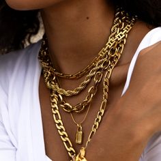 A trendy chunky link chain to elevate your stack. Chunky Link Necklace Length: 17" plus a 2" extension chain attached Width: 11mm Material: Stainless Steel Plating: 18k real gold Necklace is 100% nickel-free and cadmium-free Necklace is hypoallergenic and tarnish resistant Gold Chunky Necklace, Alpha Bracelet, Real Gold Necklace, Padlock Necklace, Layering Necklaces, Jewel Necklace, Small Boutique, Jewelry Studio, Chunky Necklace