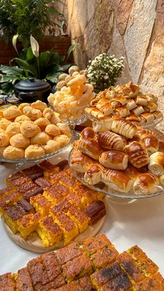 various pastries and desserts displayed on a table