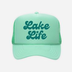 Embrace the lakeside lifestyle with our Lake Life Trucker Hat! Available in four classic colors, perfect for adding a touch of timeless charm to your waterfront adventures. Designed with a breathable mesh back and an adjustable strap, this hat guarantees a comfortable fit for all head sizes. Product Details Unisex One Size Fits All Adjustable Strap Made with Love Spring Trucker Hat For Outdoor Activities, Summer Trucker Hat For Outdoor, Summer Trucker Hat With Curved Brim For Outdoor, Summer Outdoor Snapback Trucker Hat, Summer Baseball Cap For Outdoor Activities, Summer Outdoor Hat With Curved Bill, Curved Bill Hats For Summer Outdoor Activities, Curved Bill Hats For Summer Outdoor, Curved Bill Hat For Summer Outdoor