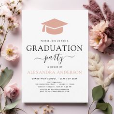 a graduation party card with flowers and greenery