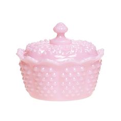 a pink ceramic covered dish on a white background