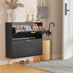 a shoe rack with many pairs of shoes on it in front of a door way