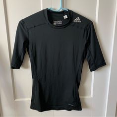 Nwot Adidas Compression Top Sporty Fitted Black Shirt, Black Fitted Sporty Shirt, Adidas Fitted Long Sleeve Activewear, Adidas Fitted Moisture-wicking Top, Fitted Adidas Moisture-wicking Tops, Adidas Stretch Moisture-wicking Tops, Adidas Moisture-wicking Stretch Tops, Adidas Functional Crew Neck Top, Adidas Workout Tops With Short Sleeves