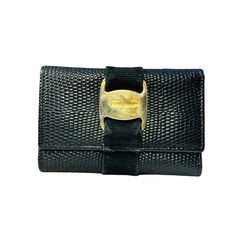 Salvatore Ferragamo Vara Black Leather Key Case Pouch Women’s Compact Unisex Preloved Great Condition *Has Some Wear From Use, Minor Wear On Gold Hardware; Please View All Photos For Details, Condition And Inclusions. This Is A Preloved Item And Is Sold As Is Kindly Note That This May Be A Pre-Loved, Luxury Item May Have Developed Minor Flaws In Its Former Life. And Or A New Unused Condition Luxury Item That Was Loved By It’s Previous Owner. By Offering It A New Home, You Are Choosing To Play A Luxury Leather Wallets With Gold-tone Hardware, Designer Clutch Wallet With Gold-tone Hardware, Black Leather-lined Pouch Clutch, Formal Wallet With Coin Pocket, Black Clutch With Leather Lining For Formal Occasions, Compact Leather Bags For Formal Occasions, Formal Black Clutch With Leather Lining, Luxury Wallets With Gold-tone Hardware For Business, Luxury Business Wallets With Gold-tone Hardware