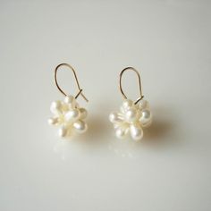 These flower shape earrings are made from freshwater pearls and 9ct gold or sterling silver safety ear hook. The pearl flowers drop delicately just under earlobe. Earring size approx. 21mm length from top of the hook, pearl flower size approx. 13mm x 13mm. The earrings are available in either 9ct yellow gold or sterling silver ear hook. Please choose your ear wire when you check out. Delicate Flower Pearl Drop Earrings, Delicate Pearl Drop Earrings With Flower Shape, Delicate Pearl Drop Earrings In Flower Shape, Delicate Flower Shape Pearl Drop Earrings, Pearl White Flower Earrings Set, Delicate Pearl White Flower Pearl Earrings, Formal Pearl Drop Flower-shaped Earrings, Handmade Flower Pearl Earrings, Delicate Pearl Earrings With Flower Charm