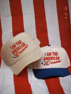 I am the American dream hat. Our limited edition 4th of July hats. Available in two different styles and colors Tan foam front trucker Blue/cream canvas hat Adjustable backing OSFA embroidery detail American Snapback Trucker Hat, American Style Snapback Trucker Hat For 4th Of July, American Style Snapback Trucker Hat, American Snapback Trucker Hat For 4th Of July, Cream Trucker Cap For Summer, Summer Cream Trucker Cap, Cream Summer Trucker Cap, 4th Of July Trucker Hat, 4th Of July Hats