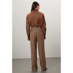 Brown plaid knit (43% Cotton, 40% Wool, 14% Nylon, 3% Other Fiiber). Lining (100% Viscose). Pants. Front zipper closure. 32" inseam. 12.5" rise. 24.5" leg opening. Imported. Brown Bottoms With Welt Pockets For Fall, Wool Bottoms For Office In Fall, Tailored Pants With Pockets For Fall, Brown Office Pants For Fall, Winter Office Brown Bottoms, Plaid Straight Leg Pants For Fall, Plaid Straight Pants For Fall, Plaid Full-length Pants For Fall, Plaid Full Length Pants For Fall