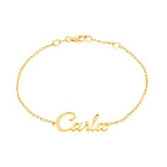 This 14k gold cursive custom name bracelet is a timeless piece. Show your love by wearing the name of the one you cherish.

Up to 11mm ht

Lobster Clasp
Sustainable
100% Recycled Gold
Handcrafted in Los Angeles Floating Diamond Ring, Diamond Bar Bracelet, Custom Gold Jewelry, Personalized Gold Jewelry, Diamond Drop Necklace, 14k Rose Gold Bracelet, Bezel Necklace, Zodiac Bracelet, Letter Bracelet