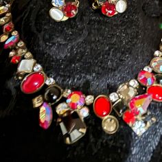 Vintage- Stunning Designer Sorrelli Glass Stone / Beads In Red. Black And Clear Stones With Matching Clip Earrings. A Burst Of Color And Vintage Richness All Stones Set In Bronze Setting As Seen On Back. Necklace Tapers On Sides Nicely. Matching Clip Earrings With Same Stones Make This A Fabulous Vintage Set. Approximately 1/2”. Necklace Adjusted Clasp With Claw Hook Retailed For $250.00 For The Set. International Designer Sorrelli Has Logo Tag On Necklace. 2 Necklace, Back Necklace, Logo Tag, Clear Stone, Clip Earrings, Necklace Earring Set, Stone Settings, Stone Necklace, Stone Beads