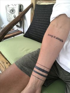 a person with a tattoo on their arm