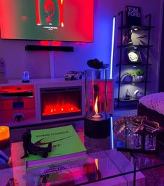 a living room filled with furniture and a flat screen tv mounted on the wall above a fire place