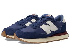 New Balance Classics 237v1 - Men's Shoes : Nb Navy/Vintage Indigo : Add a vintage runner design to your wardrobe with the iconic silhouette of the New Balance Classics 237v1 sneakers. Casual fashion shoe in a sporty silhouette. Textile and synthetic upper with lace-up closure. Foam-padded collar and tongue. Breathable textile lining with removable insole. Synthetic rubber outsole for added traction. Imported. Measurements: Weight: 12 oz Product measurements were taken using size 9, width D - Med Low-top Running Shoes With Contrast Sole, Comfortable Nylon Lace-up Sneakers, Retro Lace-up Running Shoes With Boost Midsole, Casual Nylon Sneakers For Running, Sporty Low-top Nylon Walking Shoes, Athleisure Nylon Sneakers In Athletic Fit, Retro Running Shoes With Rubber Sole For Sports, Athleisure Nylon Sneakers With Athletic Fit, Sporty Mid-top Running Shoes With Rubber Sole