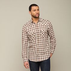 When it comes to western shirts, the Valley or "El Valle" has been well-tested for long-lasting comfort and quality. Named after the Rio Grande Valley, this long-sleeve western comes with all the tried-and-true details, including two flap pockets and a western front and back yoke. In the field or at the table, the Valley runs deep with tradition and function. Model is 6'2 and wearing size M. Western Style Brown Tops For Ranch, Western Long Sleeve Flannel Shirt For Rodeo, Country Style Button-up Shirt For Fall, Country Style Shirt For Fall Rodeo, Western Style Relaxed Fit Shirt For Ranch, Fitted Western Shirt For Western-themed Events, Fitted Long Sleeve Shirt For Western-themed Events, Brown Western Shirt For Fall, Brown Western Style Shirt For Fall