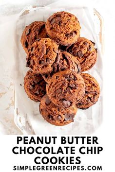 pile of peanut butter cookies with chocolate chips, on a white cutting board Cookie Biscuits, Biscuits Recipes