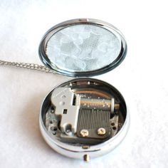 Music box locket, round locket with music box inside, in silver tone with Love and Butterfly Cabochon - Char's Favorite Things - 1 Music Box Locket, Orange And Black Butterfly, Round Locket, Music Box Jewelry, Music Boxes, Photo Locket, Black Gift Boxes, Black Butterfly, Necklace Box