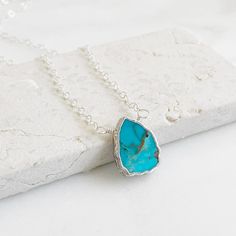 The sweetest and most unique piece for your jewelry collection. This necklace can be layered, or worn alone. GEMSTONE: Turquoise SIZE: Varies in size from 12mm-24mm CHAIN: 17" long sterling silver CLOSURE: Lobster clasp *PLEASE NOTE - Due to the one-of-a-kind nature of the stones, exact colors and patterns may vary slightly from the image shown. Silver Turquoise Jewelry, Jewelry Simple, Layering Necklace, Gems Jewelry, Simple Jewelry, Turquoise Gemstone, Silver Turquoise, Turquoise Sterling Silver, Turquoise Jewelry