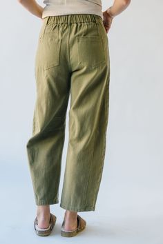 Meet your new go-to pants: The Wolford Barrel Pant in Olive. With a flattering barrel leg style, they are versatile enough for any occasion. Dress them up or down for a look that is uniquely you. Details self/lining: 100% polyester Fabric Care Guide Here Sizing & Fit Measurements are approximate and taken while laying flat across the front. Not doubled. small: waist = 14"; length = 37"; inseam = 25“; rise = 12" medium: waist = 15"; length = 38"; inseam = 25.5“; rise = 12.5" large: waist = 16"; l