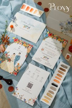 the wedding stationery is laid out and ready to be put into their guests'bags