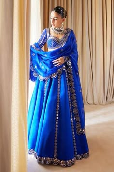 Shop for Vvani by Vani Vats Blue Satin Organza Mirror Embroidered Lehenga Set for Women Online at Aza Fashions Vani Vats Lehenga, Blue Pre-draped Saree With Gota Work For Reception, Blue Pre-draped Saree With Gota Work For Navratri, Royal Blue Unstitched Blouse Sets For Diwali, Blue Pre-draped Saree With Gota Work For Wedding, Royal Blue Unstitched Sets For Diwali, Royal Blue Sets With Unstitched Blouse For Diwali, Blue Choli With Gota Work For Wedding, Blue Floor-length Lehenga With Gota Work