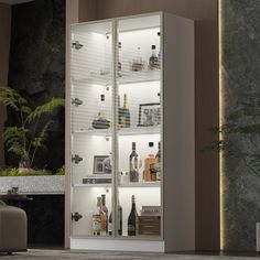 an illuminated display case with bottles and liquors in the front, along with other items