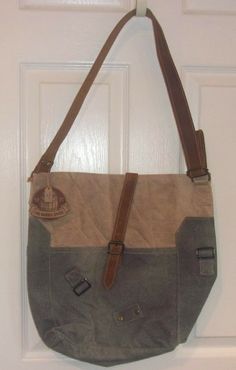 Gorgeous Handmade Shoulder Bag from The Barrel Shack! Brand new with tags. Retail $208. Height: 14" Depth: 5" Width: 15" Strap Drop: 16" The Bryant from The Barrel Shack is a handmade bag that has been crafted from vintage canvas and leather. Adjustable leather shoulder strap (16") is wide (1-1/4") and flat so it will fit comfortably on your shoulder. Closes securely with a leather strap and buckle on the front. Combination of textures, patches, leather, and two-toned canvas creates a vintage-lo Retro Shoulder Bag With Large Capacity For Everyday Use, Rectangular Canvas Shoulder Bag For School, Retro Satchel For Everyday Use With Large Capacity, Retro Large Capacity Satchel For Everyday Use, Square Canvas Shoulder Bag For School, Retro Hobo Shoulder Bag For Travel, Retro Bags With Large Capacity For Everyday Use, Retro Shoulder Bucket Bag For Travel, Retro Canvas Satchel Shoulder Bag