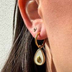 Elevate your accessory game with our unique drop earrings, a perfect blend of whimsy and elegance. These avocado-themed earrings are designed with a boho flair, adding a playful yet sophisticated touch to your ensemble. Crafted with precision, these dainty gold earrings dangle gracefully, making them an ideal choice for both casual outings and formal events.  ✨ Details: Metal: Stainless Steel Item Weight: 11g Size: 17mm x 33mm 🌎 Shipping Information: 🛫 Shipping Cost: ⚡️ Enjoy free worldwide sh Avocado Earrings, Unique Drop Earrings, Dainty Gold Earrings, Earrings Elegant, Earrings Dainty, Romantic Dates, Gold Earrings Dangle, Earrings Boho, Earrings Dangle