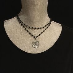 "❤️❤️❤️ On Sale 20% off and Free Shipping ❤️❤️❤️ Layered rosary chain necklace with religious cross coin pendant. Closes with a lobster claw clasp and 2\" extender chain. Made to order - single choker is 16\" or double choker has 16\" and 17\" strands. Other sizes available - please message me. Choice of pale aqua blue or black gunmetal rosary chain with 6mm beads. Pendant is a double sided cross coin in black gunmetal finish and measures 30x25mm. Fun gift for wife, girlfriend, mom, sister or fr Black Cross Necklace, Rosary Chain Necklace, Coin Choker, Choker Silver, Silk Jewelry, Blue Beaded Necklace, Pale Aqua, Beads Pendant, Boho Choker