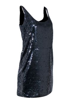 Dazzle the party scene with this sparkling sequin mini dress by Laundry. This dress is perfect for a night out on the town. The navy blue sequins catch the light beautifully and create a fun party-ready look. Style this dress with your favorite pair of strappy heels and chandelier earrings for a stunning and unforgettable outfit. Size 4 Shell 82% Nylon 18% Spandex Lining 100% Polyester Bust 38” Waist 42” Shoulder to hem length 35” Party-ready Sleeveless Dress With Contrast Sequin, Party-ready Sleeveless Sequin Dress For Night Out, Sleeveless Contrast Sequin Mini Dress For Holiday Party, Sleeveless Mini Dress With Contrast Sequin For Holiday Party, Sleeveless Sequin Glitter Dress For Night Out, Sleeveless Glitter Sequin Dress For Night Out, Sleeveless Sequin Fabric For Summer Holiday Party, Sleeveless Glitter Dress For Holiday Party, Sleeveless Blue Dress For Holiday Party