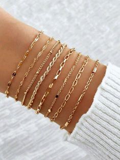 Transform your jewelry game with our 10K gold-filled adjustable bracelets set of 8, where elegance meets versatility! Each bracelet boasts a unique design, from dainty chains and bold textures to intricate patterns that add a touch of magic to any wrist. Curated for those who crave variety and style freedom, this collection invites you to mix and match for endless possibilities.  Can't decide? Choose your own of favorites or embrace the thrill of mystery by letting us pick two, three random stun Delicate Gold Bracelet, Gold Bracelet Simple, Bracelet Sets, Geometric Heart, Diy Charm Bracelet, Gold Armband, Jewelry Accessories Ideas, Gold Collar, Women Bracelet