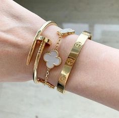 Single available or set. Set in gold. Allow 2-5 business days for delivery Van Arpels Jewelry, Cartier Love Bracelet Yellow Gold, Dream Bracelet Stack, Stacking Cartier Bracelets, Designer Bracelets Stack, Designer Bracelet Stack Gold, Gold Bracelet Van Cleef, Cartier Wrist Stack, Bracelet Stack Van Cleef