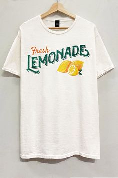 Quench your thirst for style with our Fresh Lemonade Tee. This short sleeve, vintage-inspired oversized graphic tee is garment-dyed for that perfect lived-in look. The playful "Fresh Lemonade" design adds a fun touch to any outfit. Sip on this refreshing style today! Lemonade Design, Perfect Live, Fresh Lemonade, Oversized Graphic Tee, Lemonade, Dress Shop, Vintage Inspired, Graphic Tees, Sweatshirts