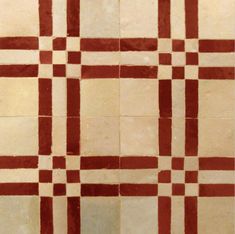 a checkerboard pattern is shown in red and white colors on the tile floor