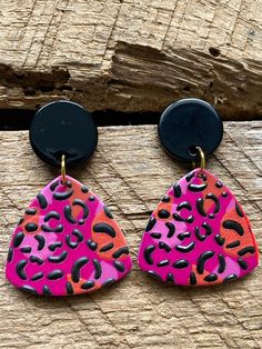 Pink and black leopard print acrylic earring pendant paired with a black post earring. The earring measures 1 1/2 inches in length. Find our full selection of earrings in our shop at https://www.etsy.com/shop/Immeasurablymore2 Follow Immeasurably More on Instagram immeasurablymore_) for special announcements, coupon codes, and giveaways Bold Black Drop Earrings, Leopard Print Earrings For Pierced Ears As Gift, Leopard Print Earrings For Gift, Immeasurably More, Leopard Earrings, Acrylic Earring, Earrings Aesthetic, Earrings Acrylic, Earrings Pink