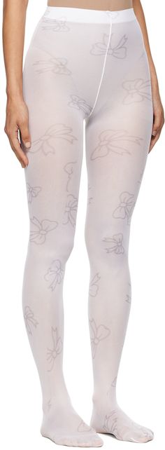 Stretch nylon jersey tights in white. Graphic pattern printed throughout. Supplier color: White White Micro-elastic Tights, White Stretch Tights, White Spring Hosiery, Spring White Tight Hosiery, White Tight Spring Hosiery, White Tight Hosiery For Spring, Spring White Stretch Tights, White Stretch Tights For Spring, Spring Stretch White Tights