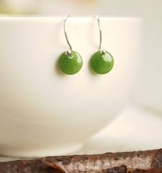 "Here are a pair of very cute nephrite jade \"dots\" earrings, set in sterling silver. Each gemstone has been carefully carved using A grade, bright green, gem quality nephrite jade and is finished with a high polish. These little jade drops measure approx. 8mm in diameter, hangs approx. 1/2\" total. These earrings are as cute as a button and are very fun to wear :) Please note that natural precious gemstones may include natural inclusions. Our jade is 100% genuine. We work with nephrite jade in Nickel Free Round Green Earrings, Nickel-free Green Round Earrings, Green Round Earrings, Green Nickel-free Round Earrings, Green Minimalist Sterling Silver Earrings, Minimalist Green Sterling Silver Earrings, Hypoallergenic Round Jade Earrings, Green Jade Nickel-free Earrings, Nickel-free Green Jade Earrings