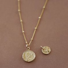 Double coin charm necklaceInterchangeable charm necklaces4 in 1 styleOur new collection of charm necklaces have interchangeable drops that can be worn 4 different ways. The classic 18" gold filled satellite chain has been a customer favorite for years, and now these pieces come with charms that can be added or subtracted. Charm Necklaces, And Now, New Collection, Charm Necklace, Gold Filled, Coin, Charms, Necklaces, Chain