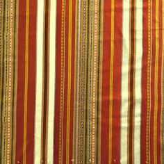 an orange and yellow striped fabric