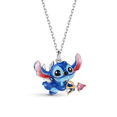 Featuring a beloved cartoon character, this necklace can be an eye-catching addition to most outfits. Crafted in sterling silver with red enamel ears, the adorable extraterrestrial holds a heart-shaped arrow. Be love-struck by extraterrestrial with this adorable necklace.Carat Weight: 0.145 ctStone Size: 3*3 mmStone Type: Jeulia® StoneNumber of Stones: 1 Stone Color: FuchsiaStone Shape: HeartWeight: 4 gWidth: 22.4 mmHeight: 18.5 mmThickness: 8.2 mmMaterial: 925 SilverPlating Color: Silver, Yello Stitch Things, Cupid Arrow, Stitch Necklace, Lilo And Stitch Merchandise, Chest Ideas, Apple Watch Bands Fashion, Stitch Stuff, Dreamy Garden, Stitch Drawing