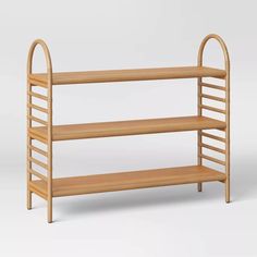 a wooden shelf with two shelves on each side