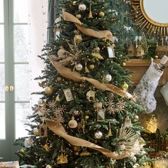 a decorated christmas tree in a living room