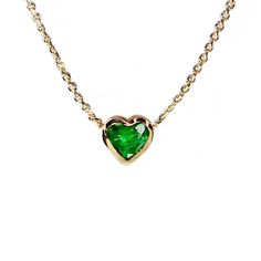 The perfect gift for the one you love, a beautiful 14k gold natural green emerald heart shaped necklace. ---------------D E T A I L S--------------- - Approximately .15 - .20 carat total weight natural emerald heart | 3.7 x 3.6 mm - Set in a 14k gold bezel setting - 14k gold cable chain with spring ring - Available in 14k white, yellow or rose gold - Sizes 15 - 20 inches Heart Shaped Emerald Necklace As A Gift, Heart-shaped Emerald Necklaces As A Gift, Heart-shaped Emerald Necklace As A Gift, Heart-shaped Emerald Necklace For Gift, Green Heart Cut Necklace For Gift, Emerald Heart Pendant Necklace As A Gift, Heart-shaped Emerald Necklaces For Anniversary, Heart-shaped Emerald Necklace For Anniversary, Valentine's Day Heart Shaped Emerald Jewelry