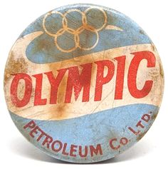 an olympic logo is shown on the back of a bottle cap that says, petroleum co ltd