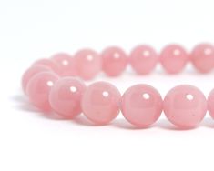 Guava quartz have rich pink color, its name come from tropical fruit guavas. Guava quartz is not transparent like rose quartz. Beads size: 8mm Color: Pink Quality: Small spots of black inclusions. This is rare round shape guava quartz. Photo: They are examples of bracelet you'll receive. Same color and quality of beads will be used. 3 PACKAGING STYLE - Bracelet only (light package with no pouch or box) - Jewelry pouch (you can store the bracelet when not in use) - Jewelry pouch & box (Ready Pink Rose Quartz Round Beaded Bracelets, Pink Bracelets With Polished Beads, Pink Round Bracelets With Polished Beads, Pink Polished Beads Bracelet, Pink Polished Beaded Bracelets, Pink Bracelets With 8mm Round Beads, Keep Bracelet, Guavas, Rose Quartz Beads