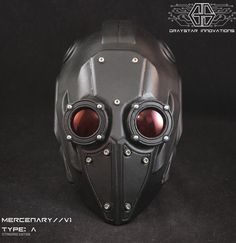 "This is a matte black and red variant of my \"MERCENARY//V1:Type-A\" full head helmet design, featuring red tinted lenses. Tech Specs: Frame Material - High durability Resin + Fiberglass reinforcement Armor Material - 3d Printed/Steel Fasteners Lens - Tinted Circular \"Type A\" Lenses If you would like this helmet in a custom color, check out this listing here! https://www.etsy.com/listing/1019108565 Made for adults and made in limited runs, custom sizing is not currently available, thank you! Black Helmet Shaped Mask For Protection, Black Helmet-shaped Masks And Prosthetics For Protection, Futuristic Black Helmet Mask, Futuristic Black Helmet Mask And Prosthetics, Post-apocalyptic Full Face Black Mask, Black Sci-fi Full Face Mask, Sci-fi Full Face Black Mask, Helmet Cyberpunk, Steampunk Helmet